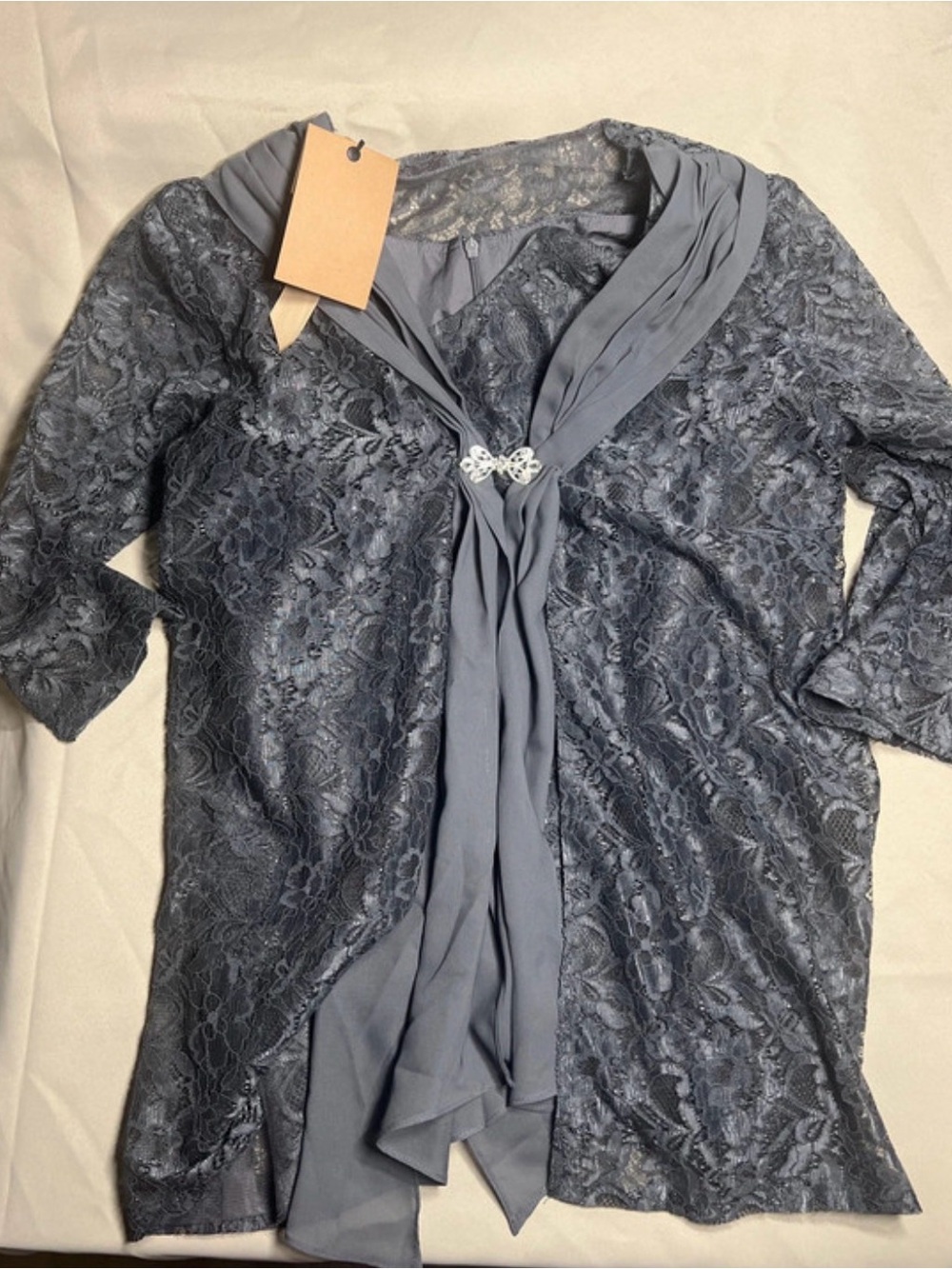 Gray Lace Tunic with Draped Scarf and Decorative Brooch